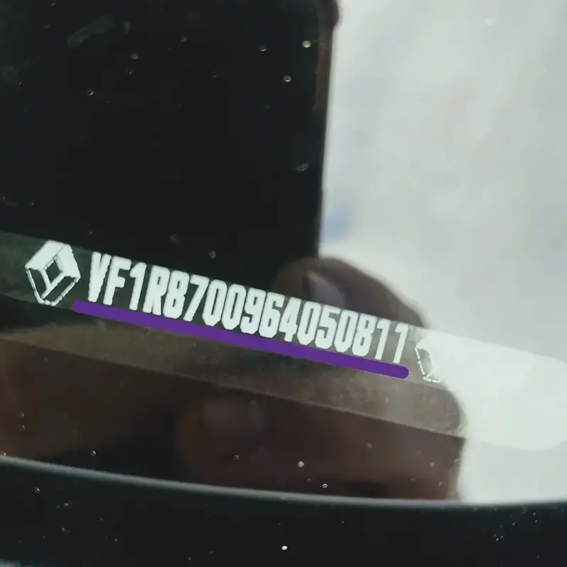 Renault VIN location on windshield for original radio code retrieval