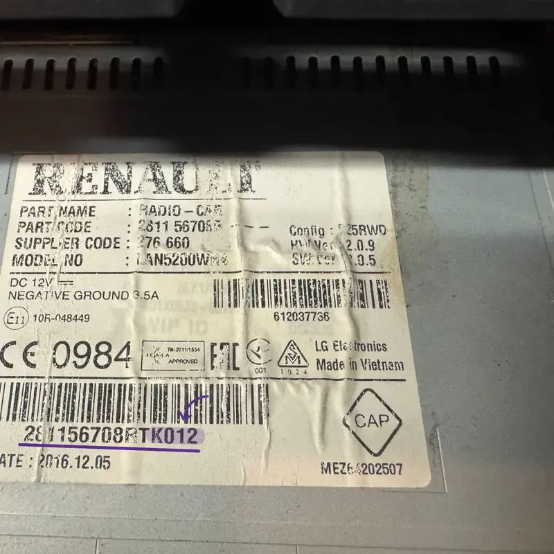 Dacia radio serial number location on the side sticker label showing pre-code
