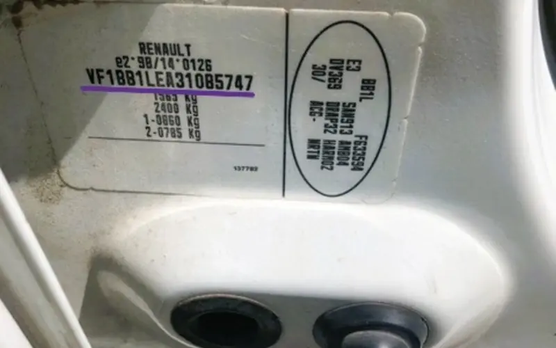 Renault Trafic VIN location sticker on the driver side door pillar