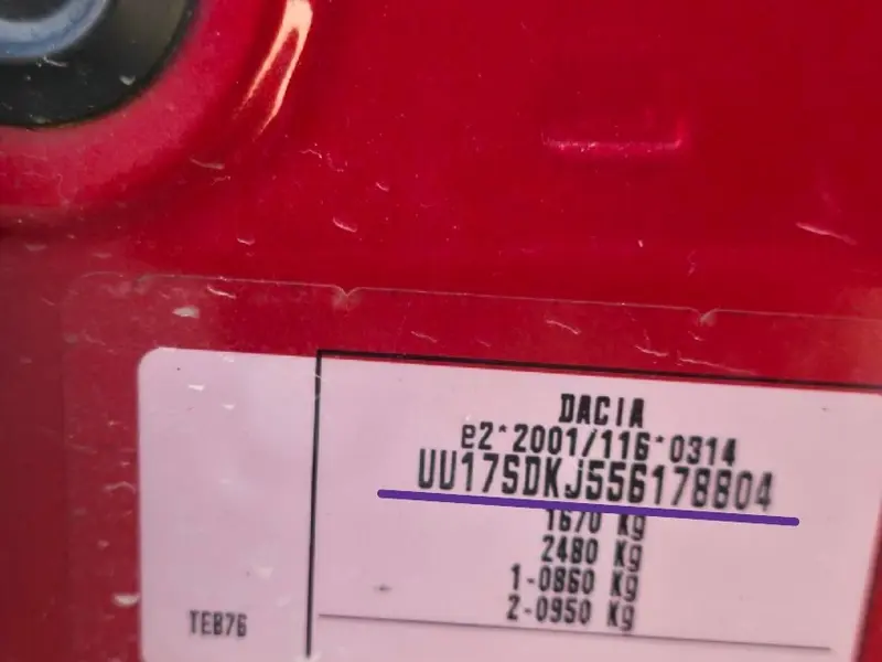 Dacia Lodgy Stepway white manufacturer sticker location containing the VIN chassis number on the passenger door pillar