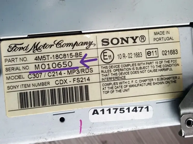 Ford Sony CD132 stereo metal casing sticker label showing serial number